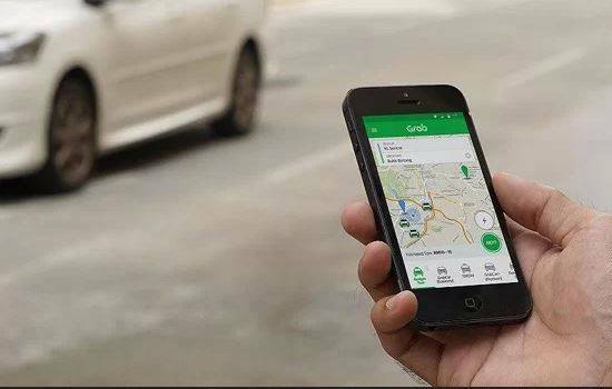 Xe Grab đang được thí điểm là xe hợp đồng điện tử